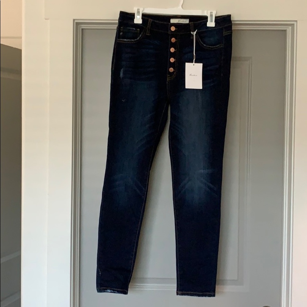 High rise skinny jeans with button fly